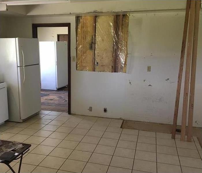 removed cabinets, showing demo wall and supports