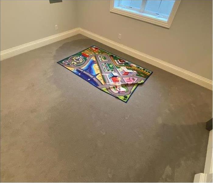 soaked carpet, game map on floor, window closed,